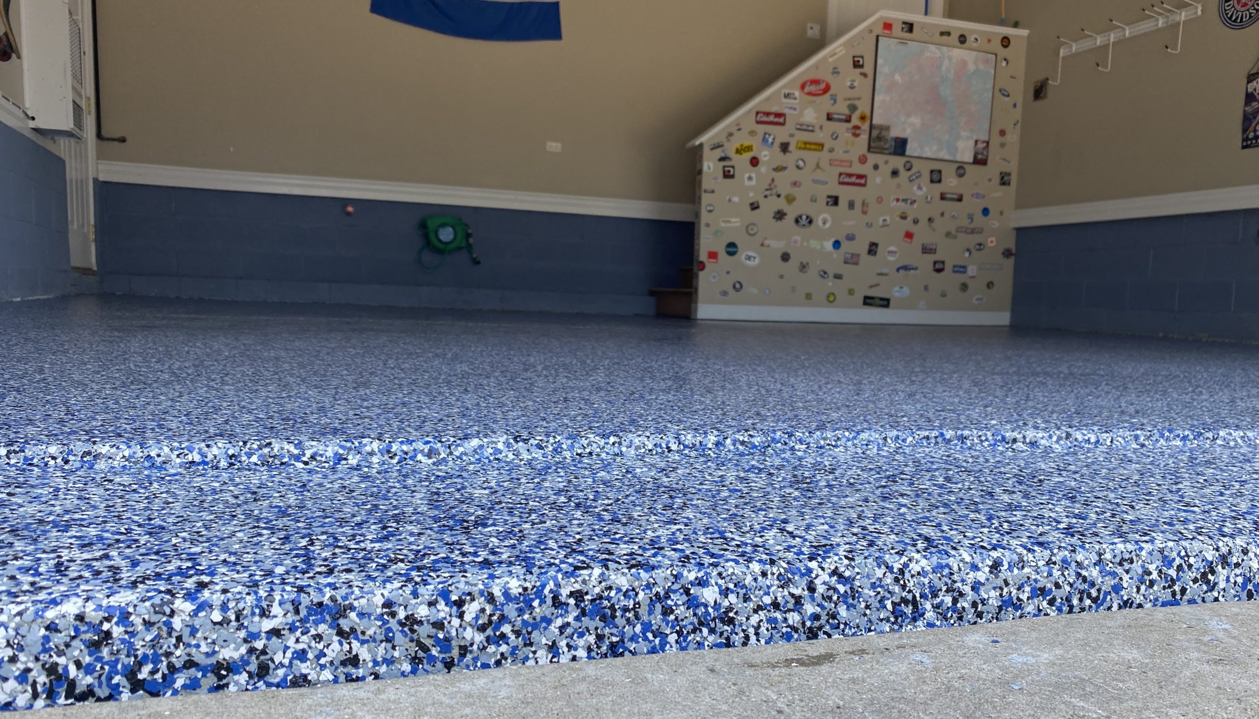 closeup photo of a polyaspartic garage floor covering